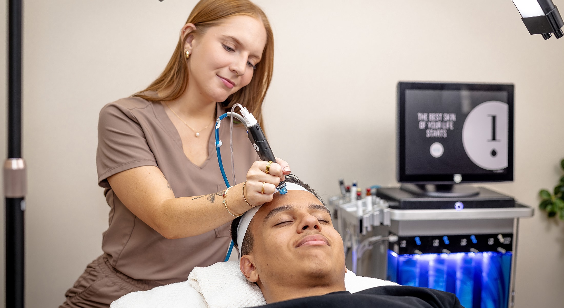 Facial treatment in a skincare clinic setting.