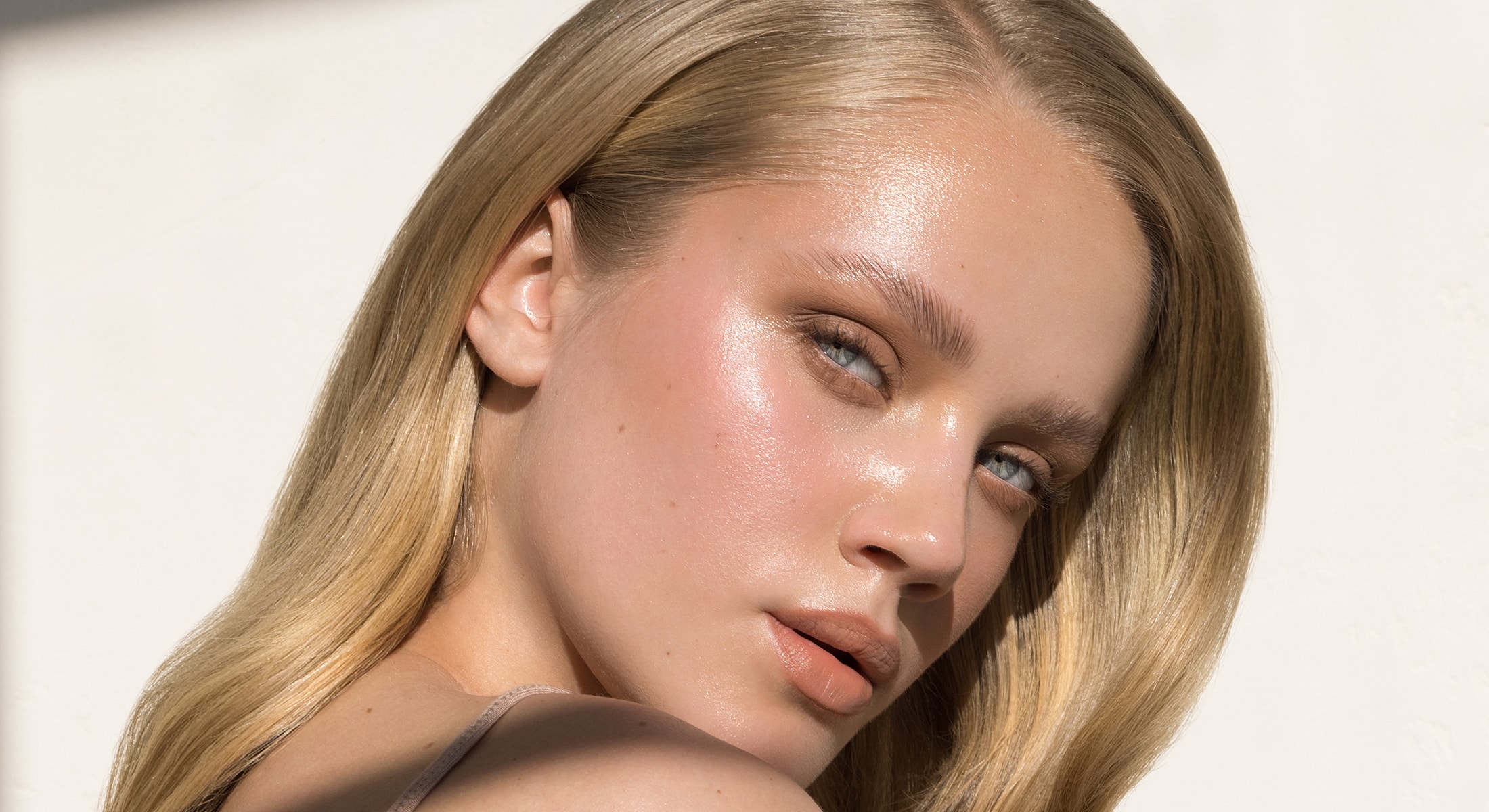Close-up of a woman with blonde hair.